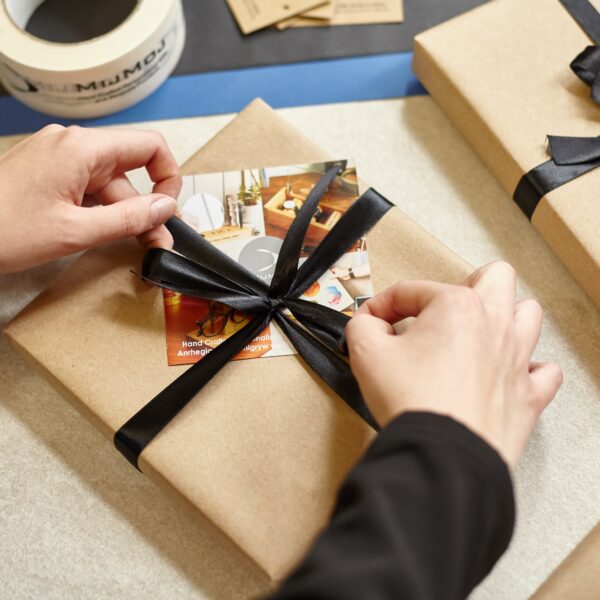 Gift wrap with black ribbon