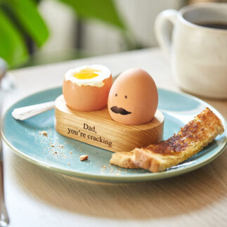 Oak egg cup with engraving 'Dad you're cracking!'