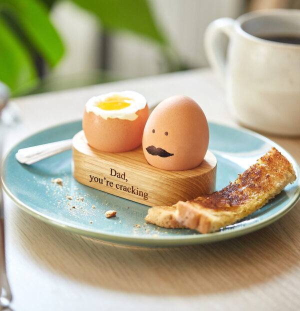 Oak egg cup with engraving 'Dad you're cracking!'