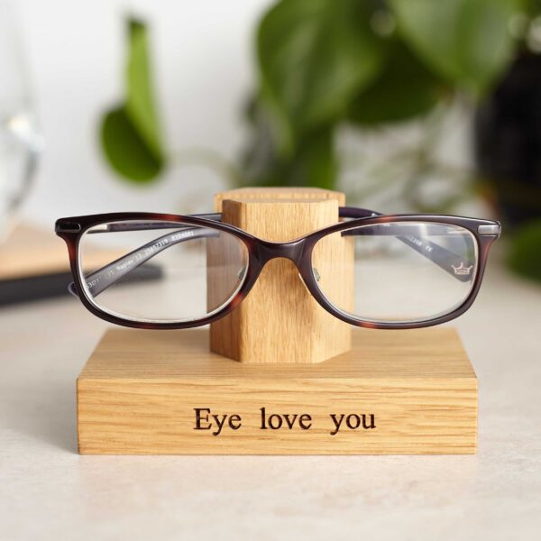 Solid oak glasses stand with 'Eye Love You' engraved on the base