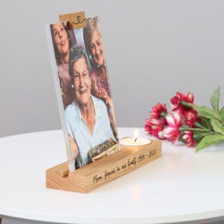 Photo frame held in an oak block with a tea light holder and engraved message on teh front