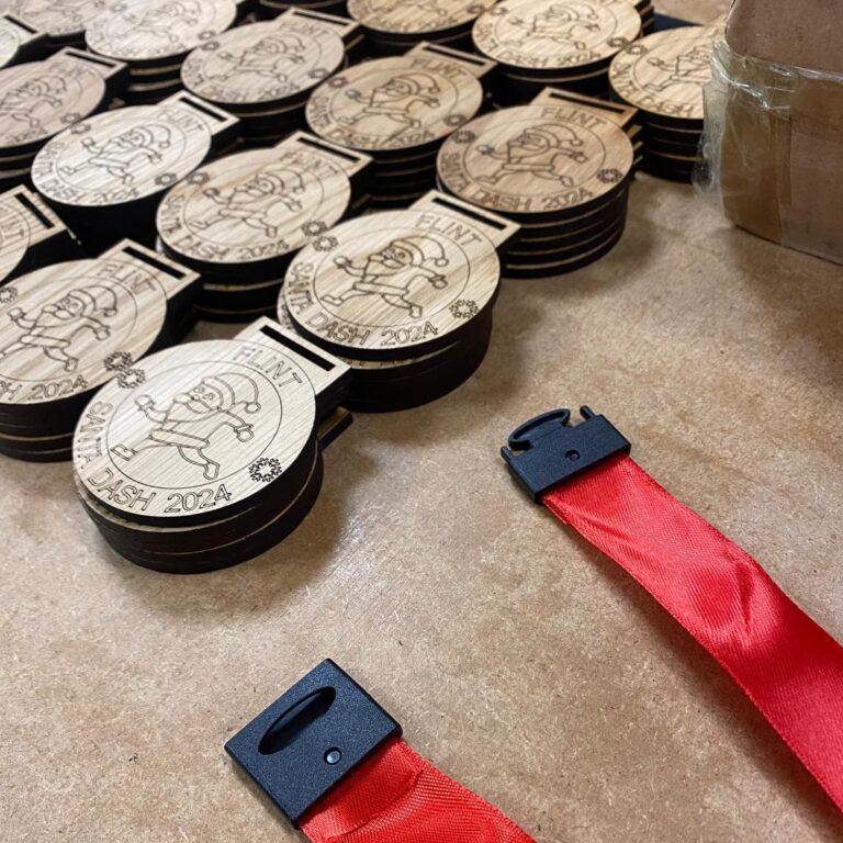 Santa Dash Medals with red ribbon