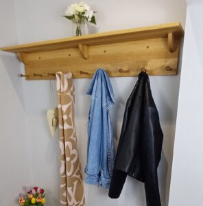 Bootroom oak coat rack with storage shelf