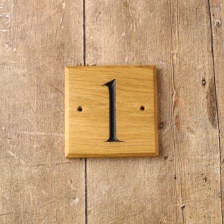 Oak house number plaque in solid oak with number 1 engraved and painted in black