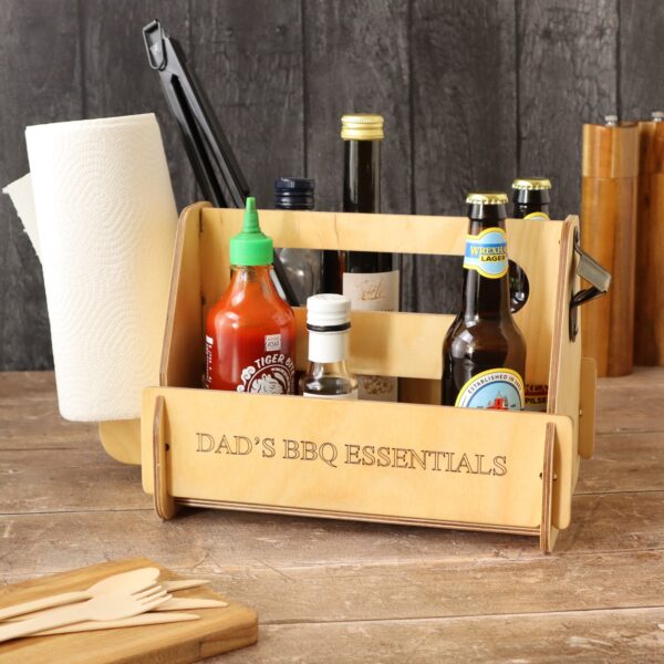 Personalised Portable BBQ Caddy With Bottle Opener with 'Dad's BBQ Essentilas' engraved on the side.