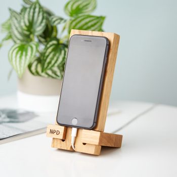 Engraved oak phone stand