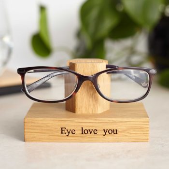 Solid oak glasses stand with 'Eye Love You' engraved on the base