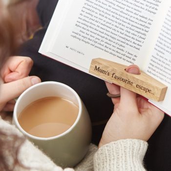 Oak page spreader keeping book pages apart with Mum's favourite escape engraved